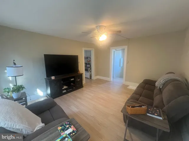 a bedroom with a bed and a lamp