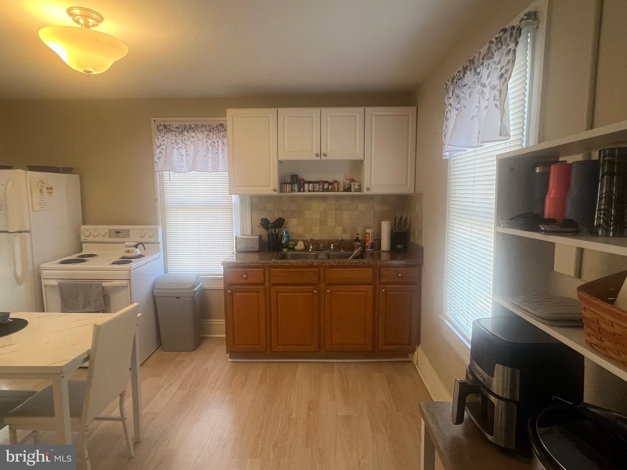 810 North Division Street Salisbury, MD 21801 - Photo 6 of 38 Unit B Kitchen includes fryer, microwave, dishes