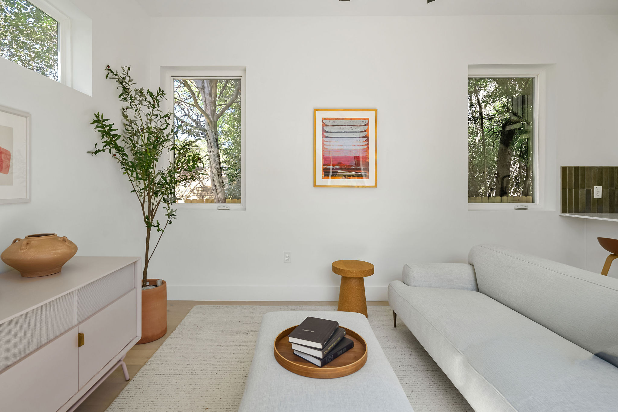 2611 Davis Lane, Unit 2 Austin, TX 78745 - Photo 6 of 23 Living room featuring plenty of natural light and baseboards