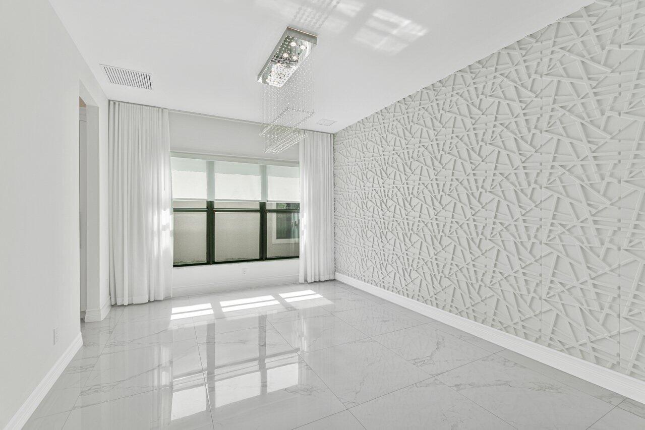 17352 Rosella Road Boca Raton, FL 33496 - Photo 14 of 41 a view of an empty room with a window