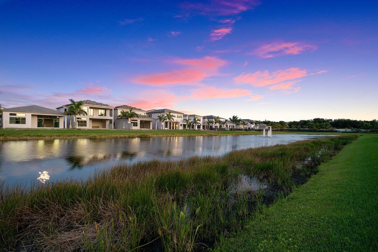 17352 Rosella Road Boca Raton, FL 33496 - Photo 40 of 41 a view of a lake with a house in the background
