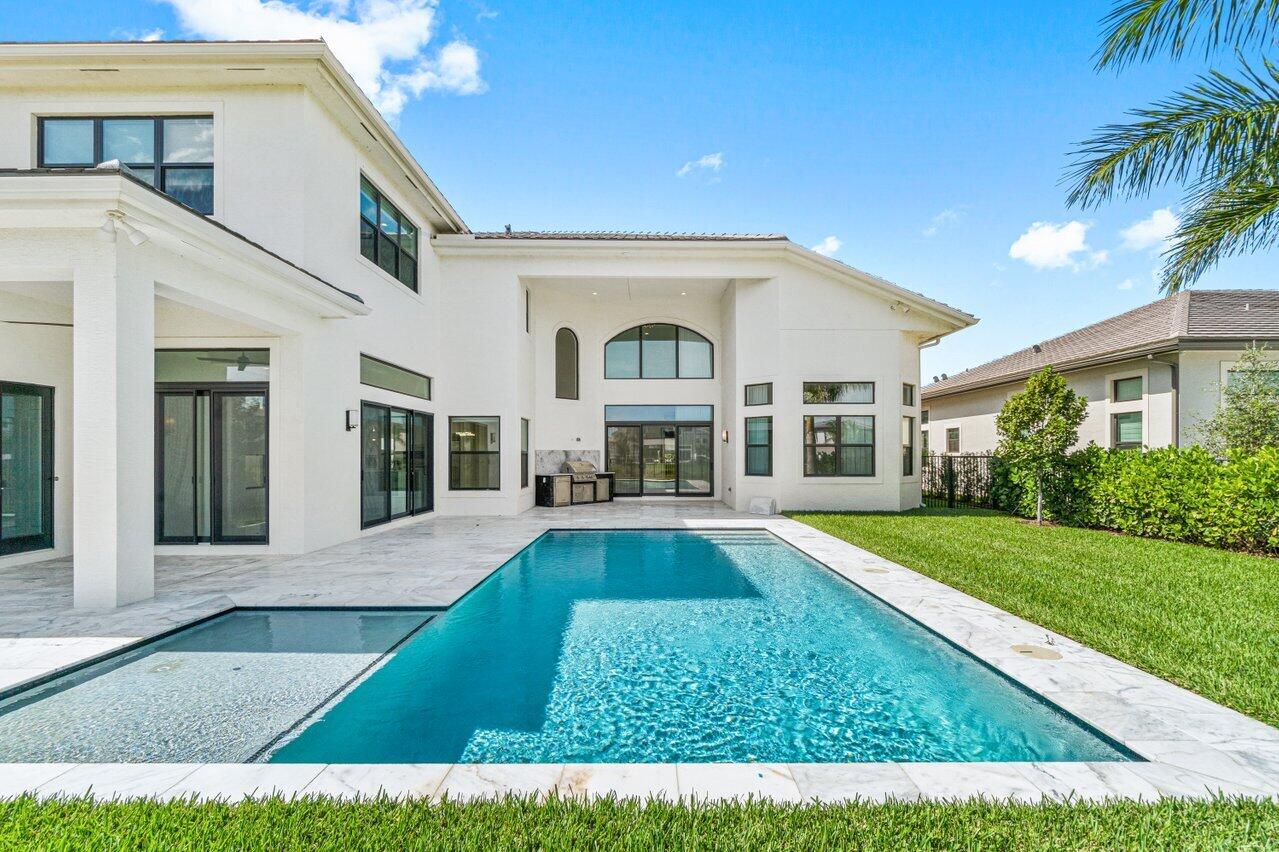 17352 Rosella Road Boca Raton, FL 33496 - Photo 4 of 41 a front view of a house with garden