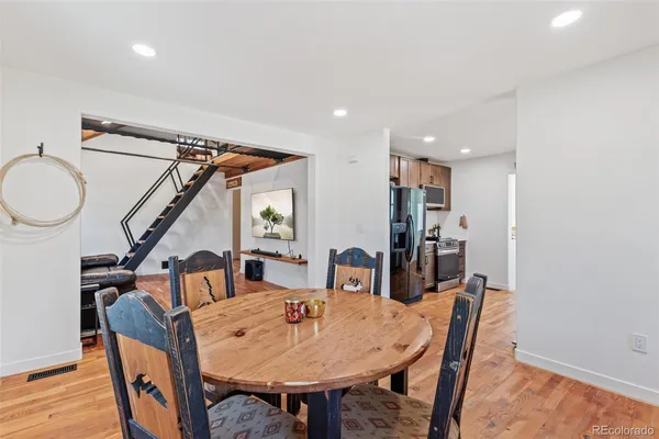 a view of a dining room with furniture