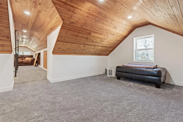 a view of livingroom with furniture and windows