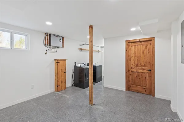 a view of a room with walk in closet and window