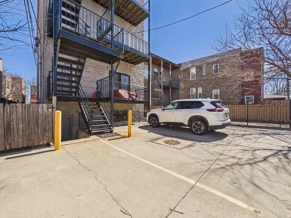 a car parked in front of a building