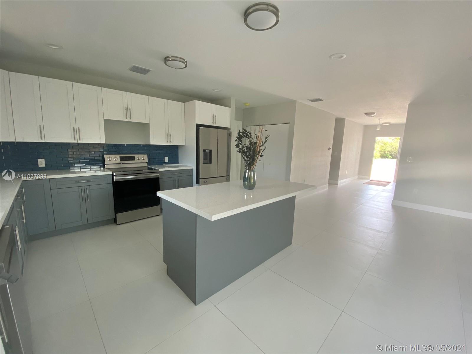 210 West 37th Street Riviera Beach, FL 33404 - Photo 1 of 9 Gallery Image 1