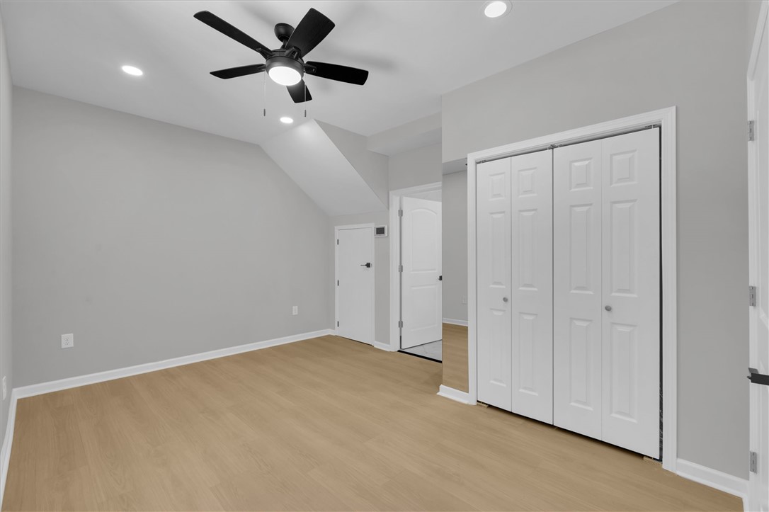 159 Cherokee Trail Easley, SC 29640 - Photo 20 of 38 A quiet, well-lit bedroom features ample closet space and wood flooring for comfort.