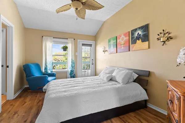 a bedroom with bed and window