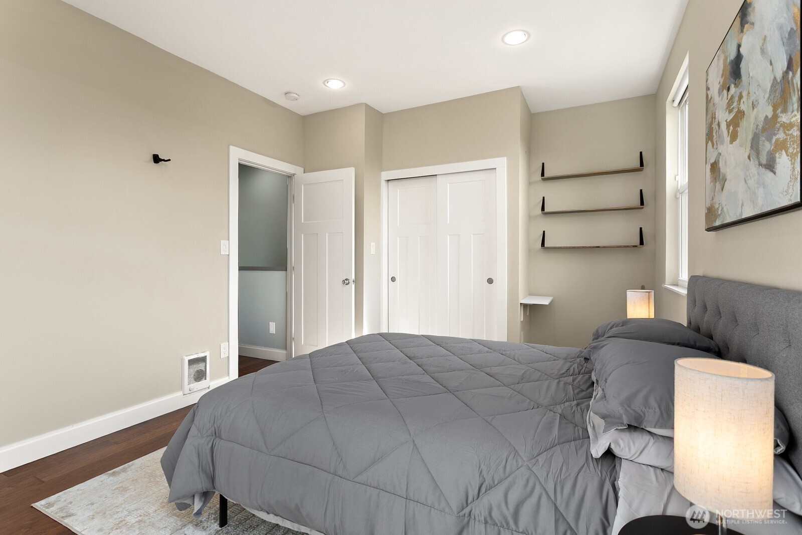 2323 12th Avenue South Seattle, WA 98144 - Photo 15 of 36 a bedroom with a bed and a chair