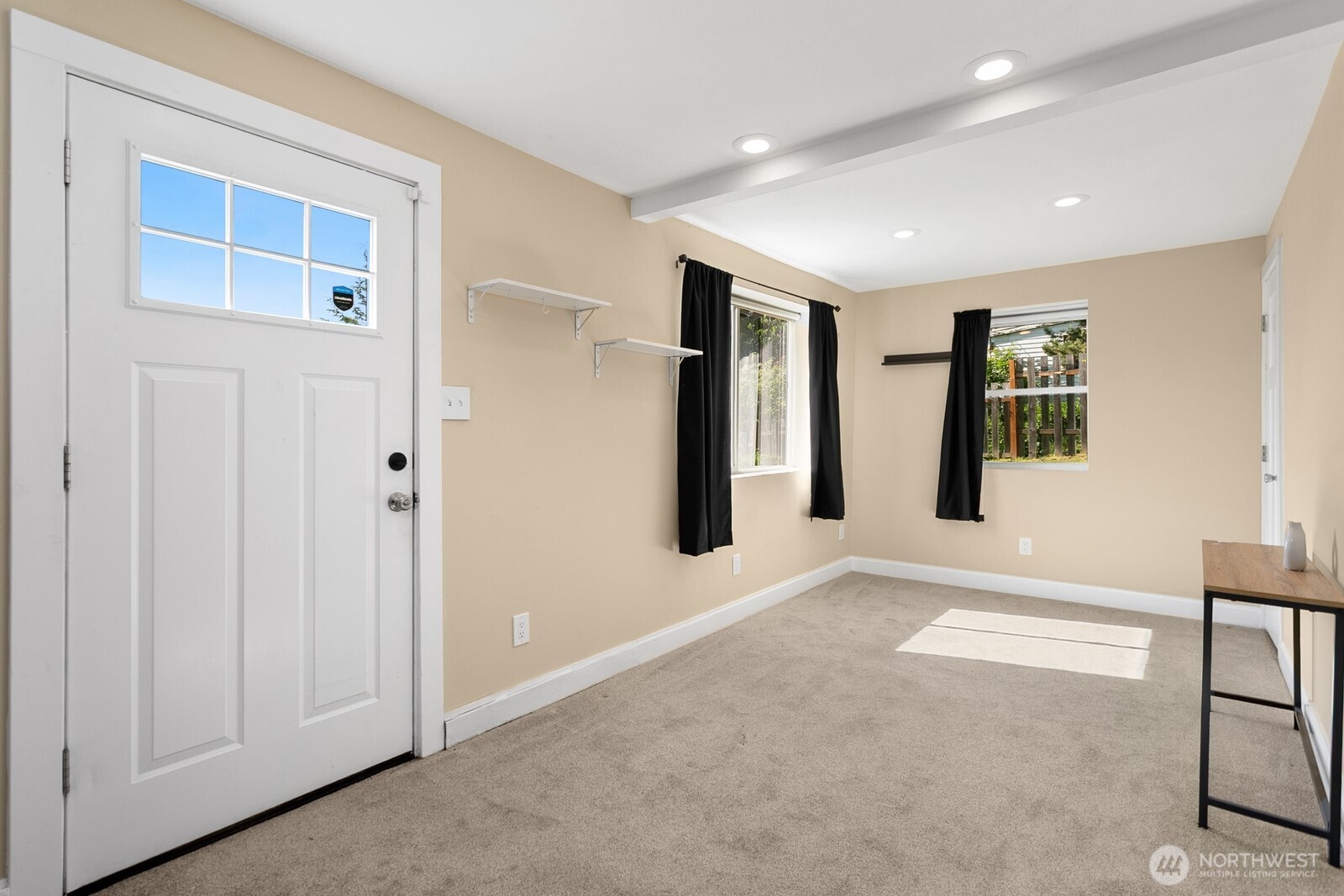 2323 12th Avenue South Seattle, WA 98144 - Photo 20 of 36 a view of a livingroom with wooden floor and windows
