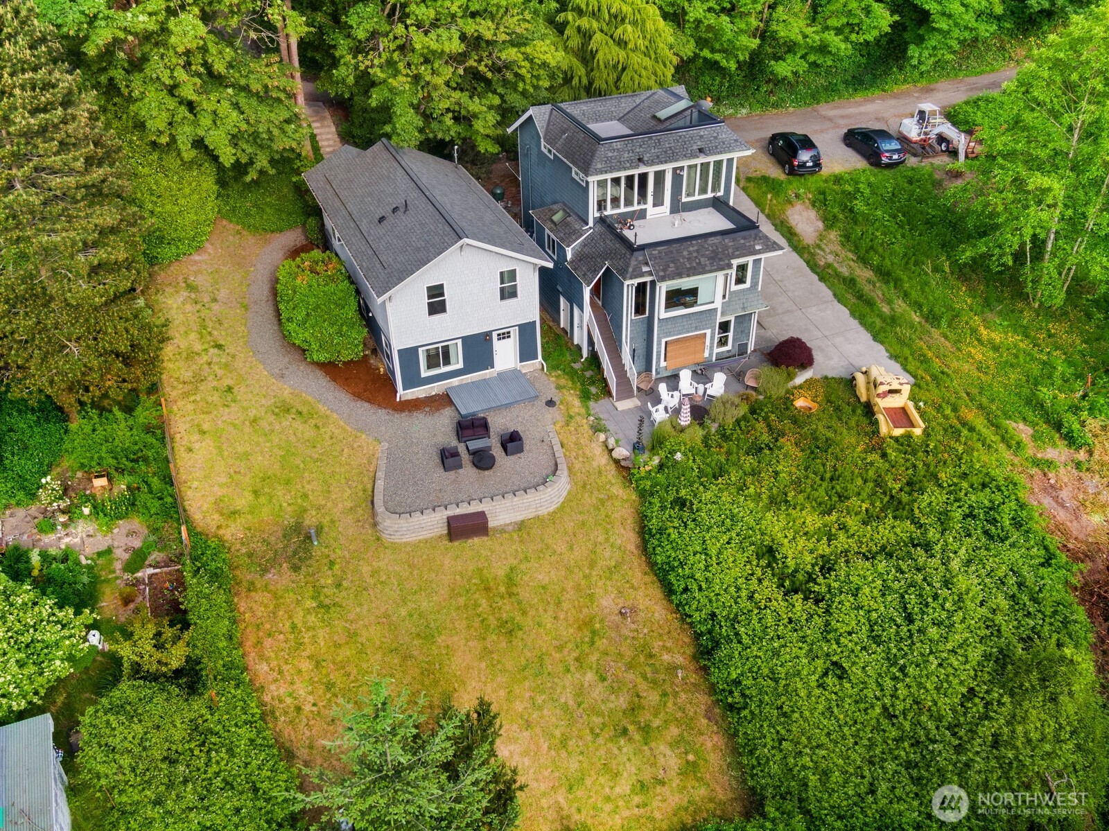 2323 12th Avenue South Seattle, WA 98144 - Photo 34 of 36 an aerial view of a house with a garden and trees