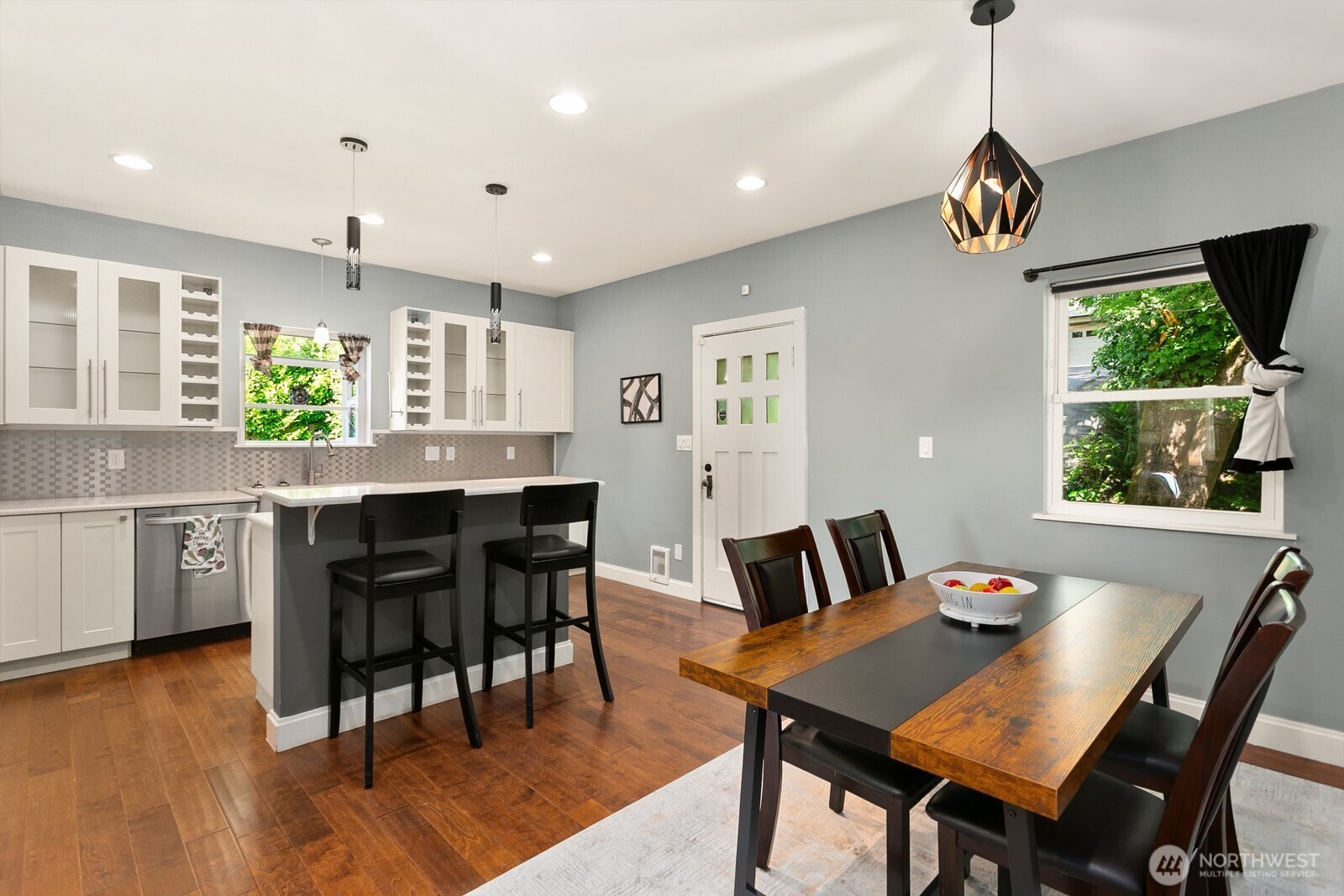 2323 12th Avenue South Seattle, WA 98144 - Photo 5 of 36 a view of a dining room with furniture window and wooden floor