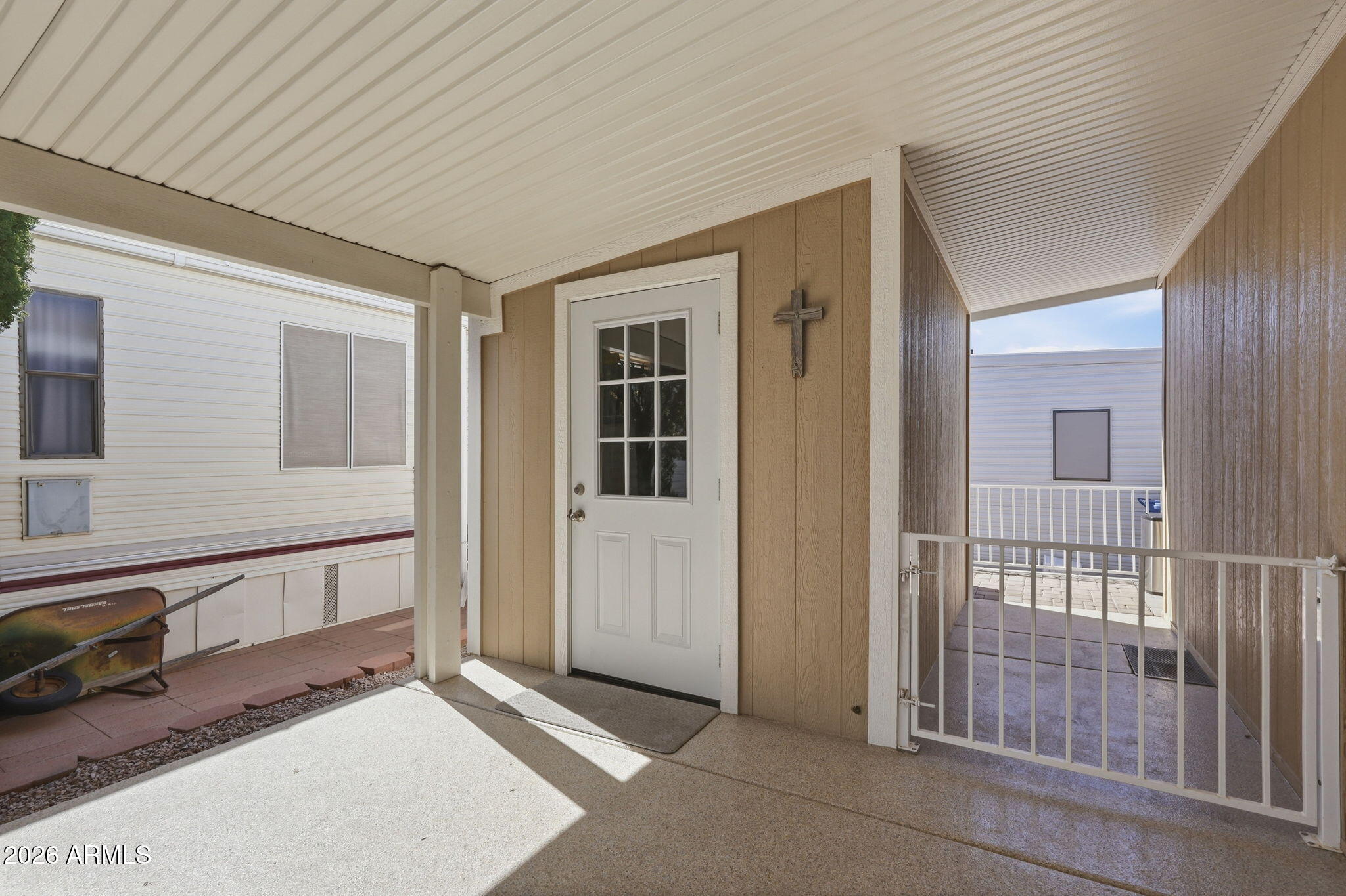 8865 East Baseline Road, Unit 1417 Mesa, AZ 85209 - Photo 27 of 47 a view of a hallway with windows