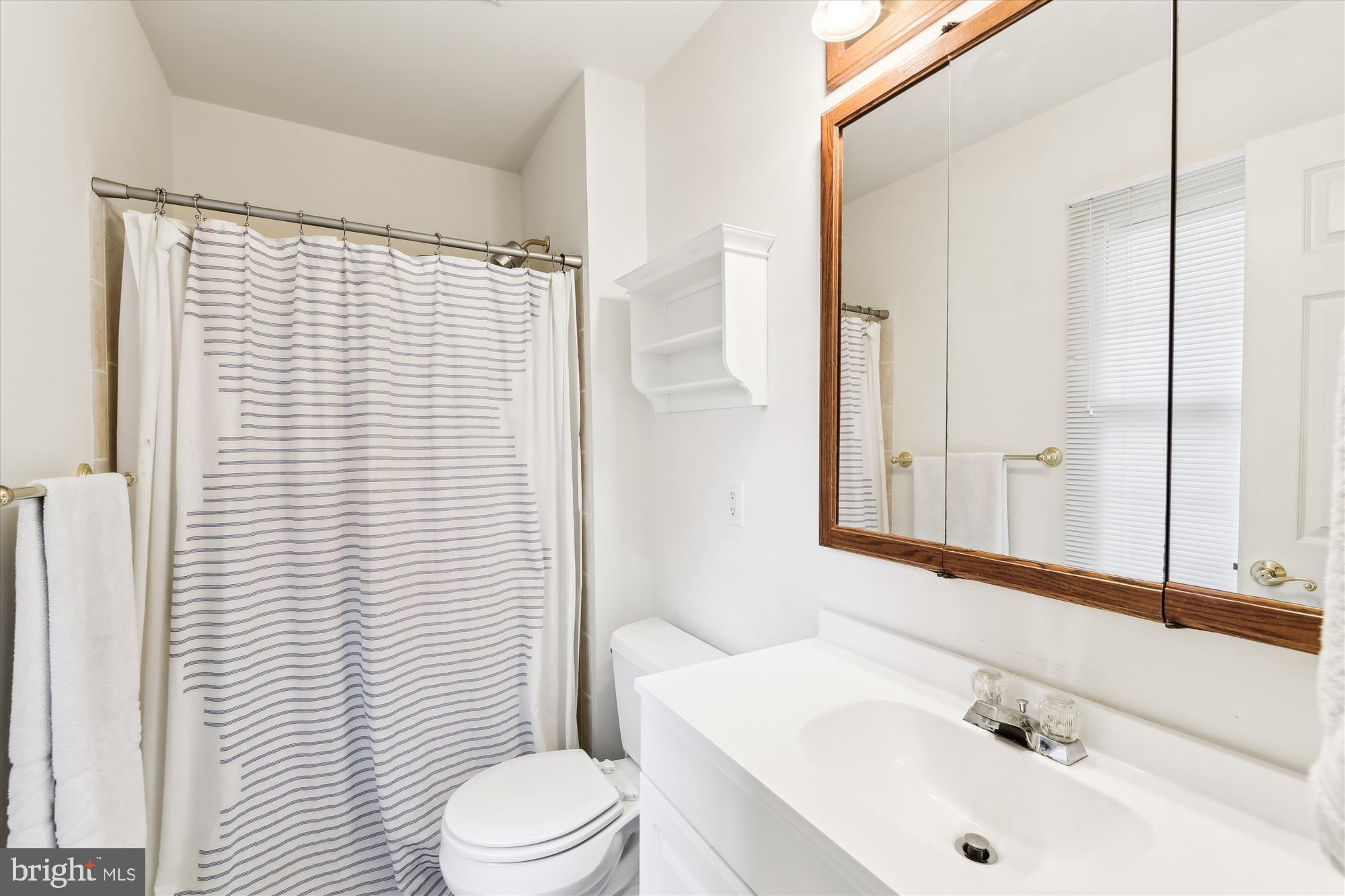 421 Haverhill Road Joppa, MD 21085 - Photo 20 of 32 a bathroom with a sink a toilet and shower