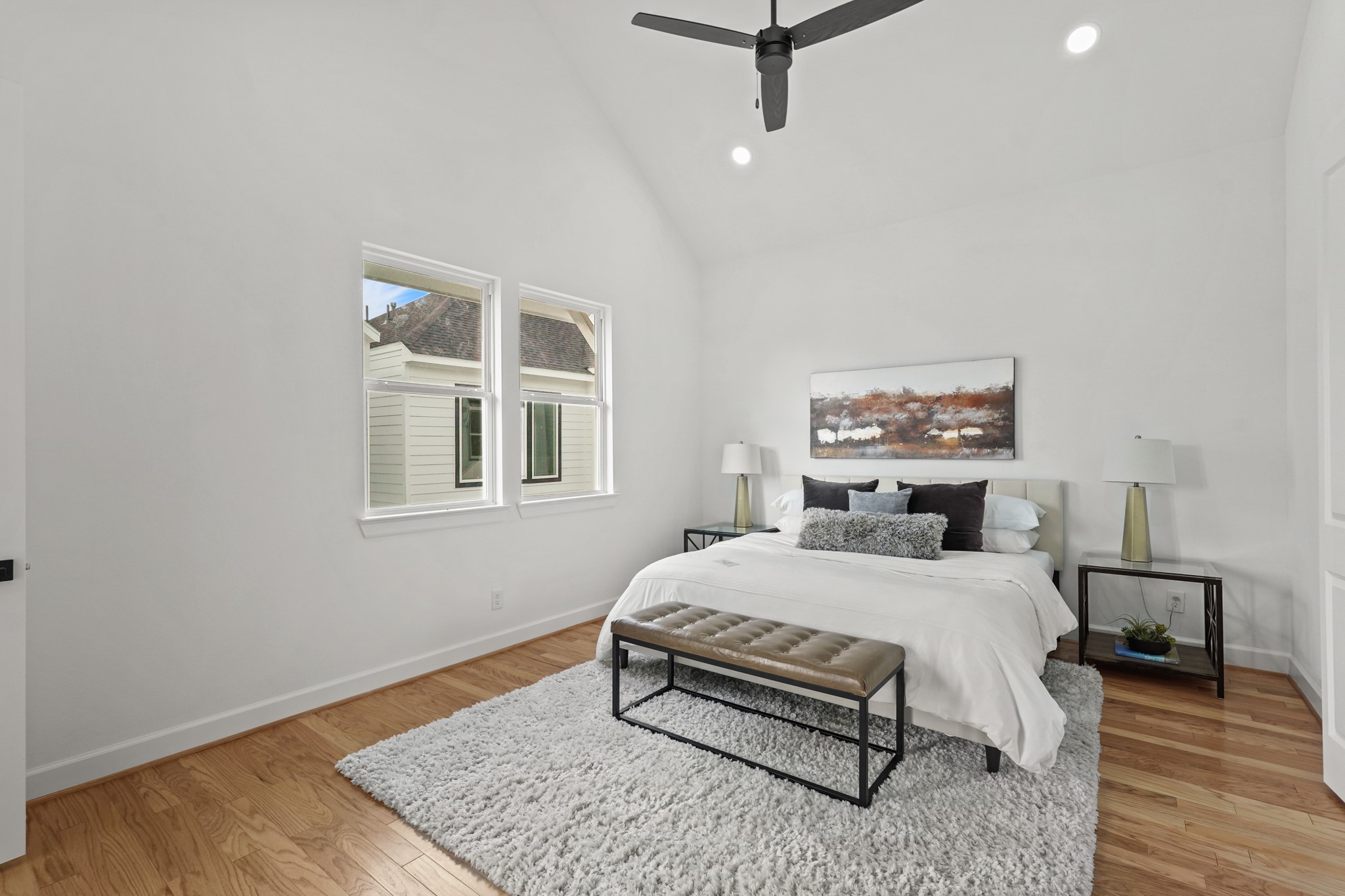 9426 Campbell Road, Unit B Houston, TX 77080 - Photo 19 of 28 a bedroom with a bed lamp closet and window