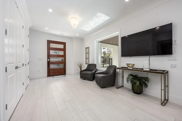 a kitchen with stainless steel appliances white cabinets and a sink