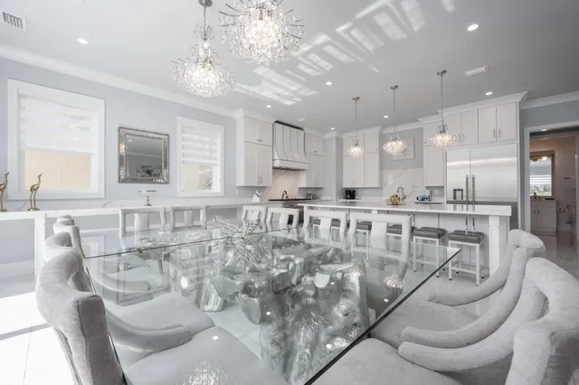 a white tub sitting in a room next to a window