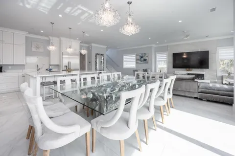 a living room with a couch and a large window