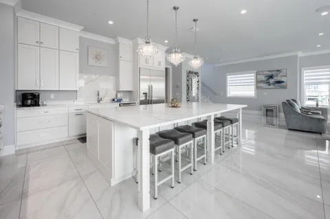 a bedroom with furniture and a flat screen tv