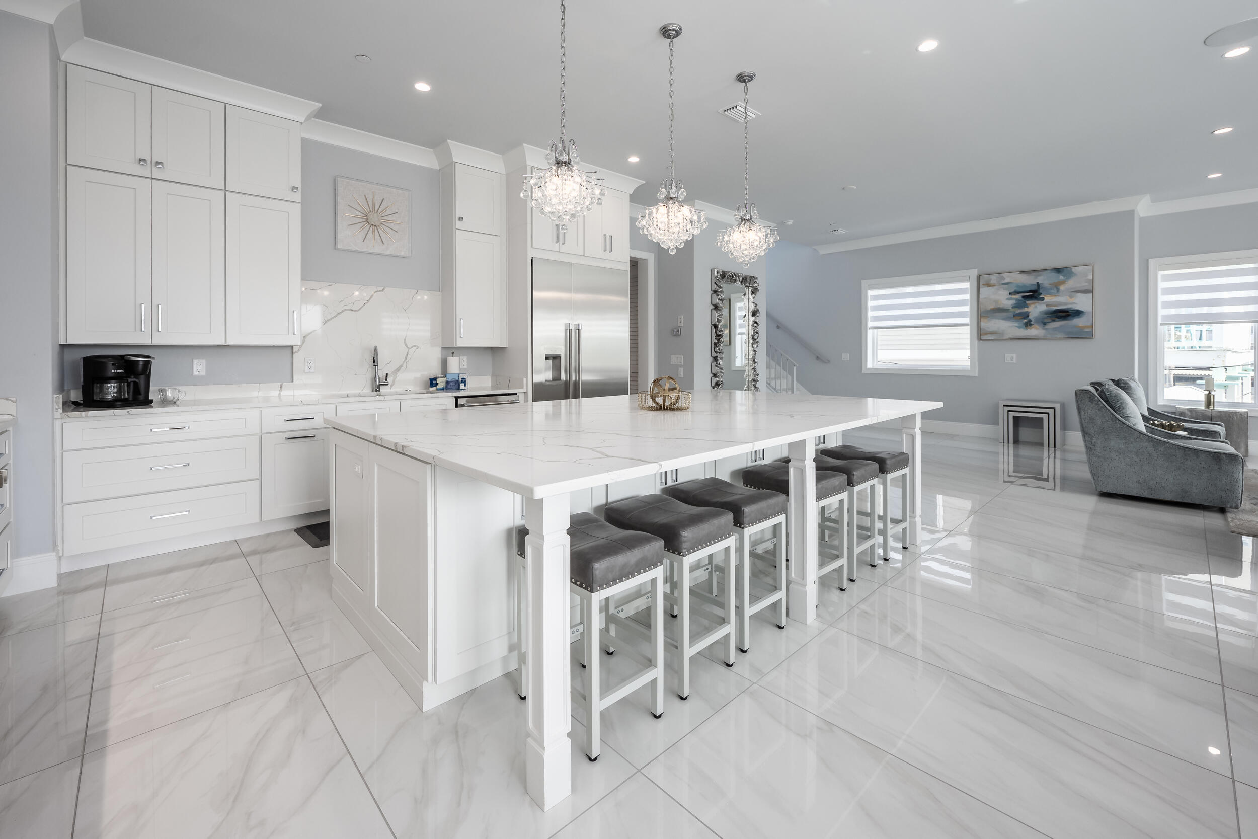 244 Open Gulf Street Miramar Beach, FL 32550 - Photo 37 of 151 a large white kitchen with lots of counter space and breakfast area