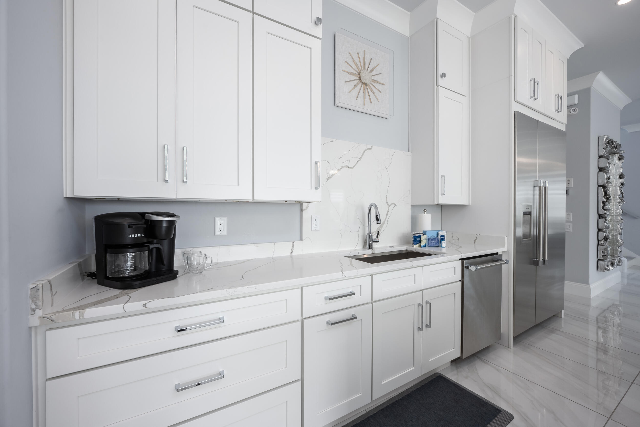 244 Open Gulf Street Miramar Beach, FL 32550 - Photo 39 of 151 a kitchen with stainless steel appliances white cabinets and a sink
