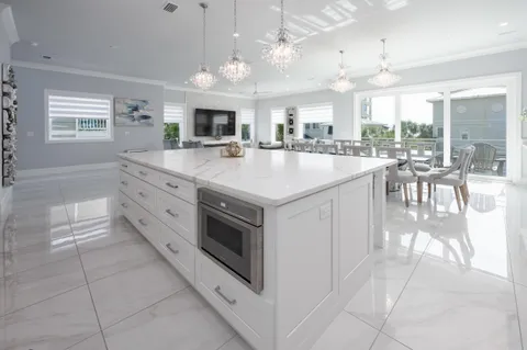 a bedroom with a balcony a bed and a couch