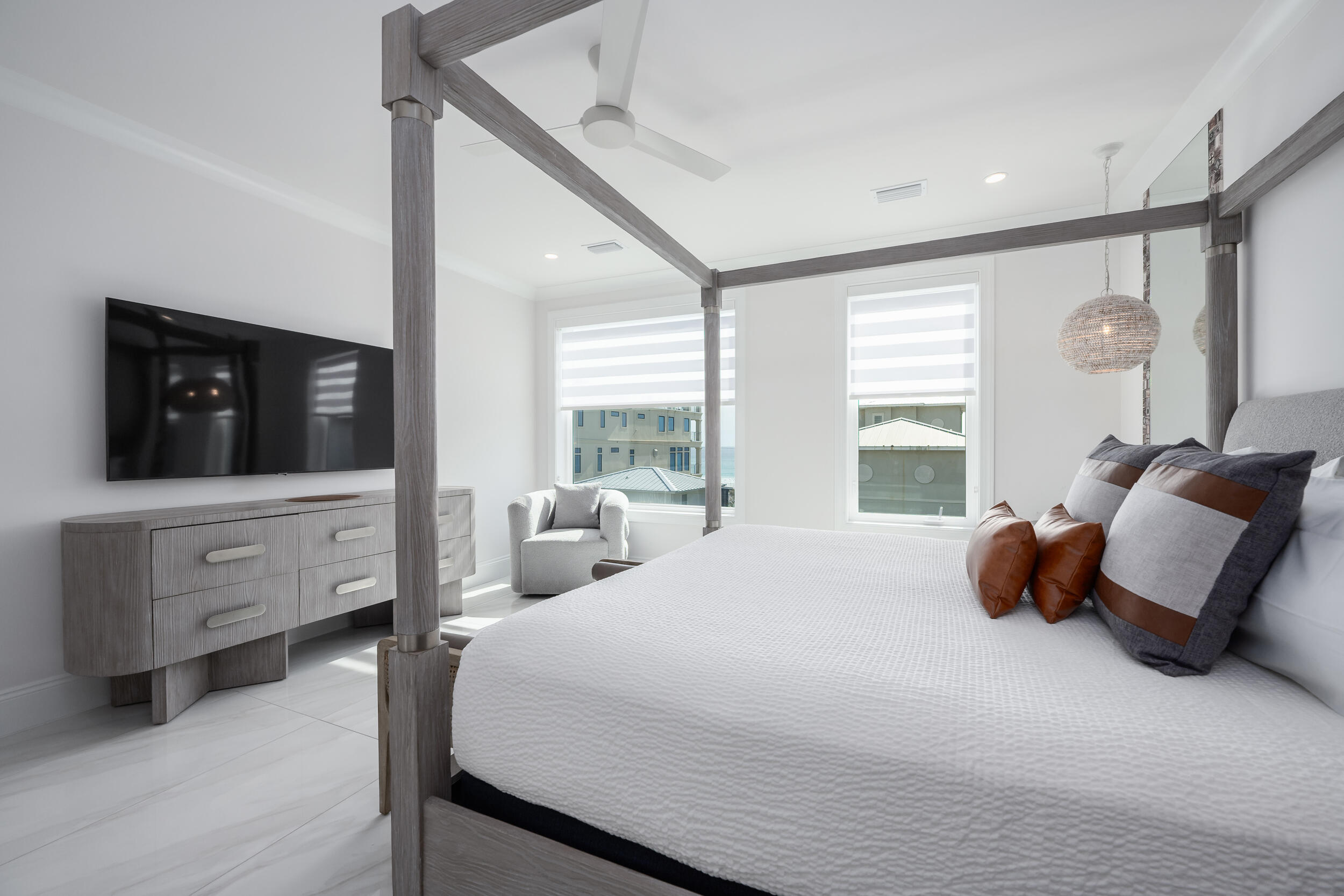 244 Open Gulf Street Miramar Beach, FL 32550 - Photo 52 of 151 a bedroom with a bed and flat screen tv