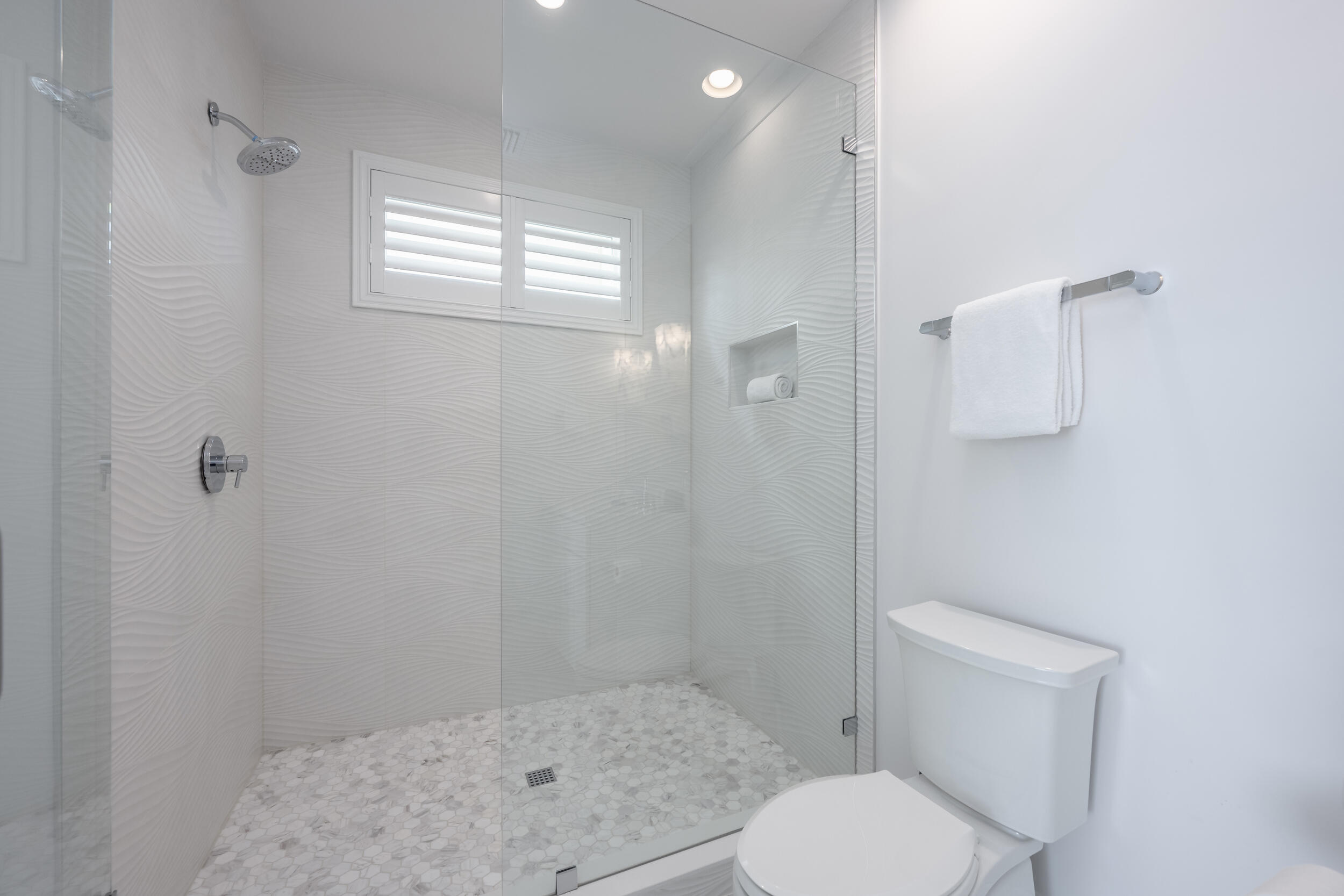 244 Open Gulf Street Miramar Beach, FL 32550 - Photo 55 of 151 a white toilet sitting next to a bathroom sink and vanity