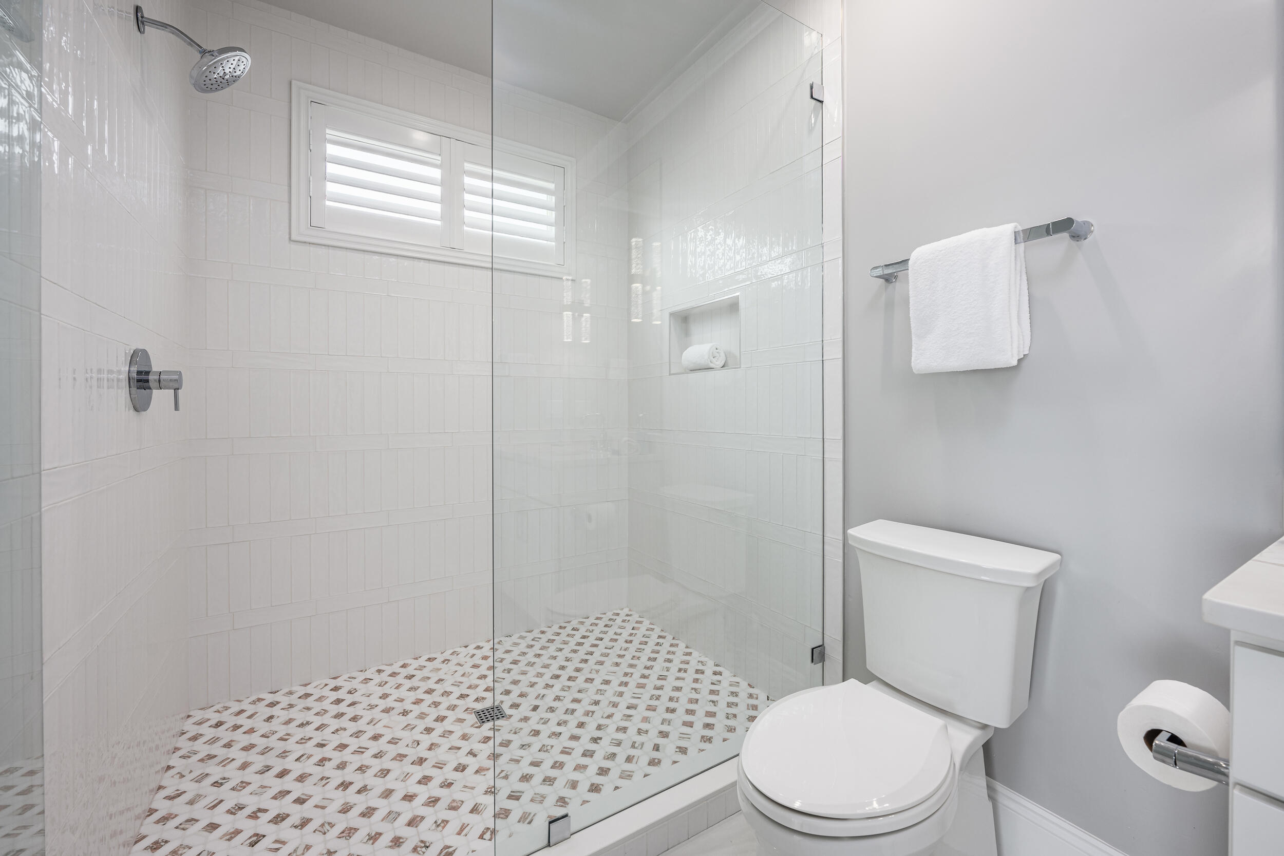 244 Open Gulf Street Miramar Beach, FL 32550 - Photo 95 of 151 a white toilet sitting next to a bathroom sink