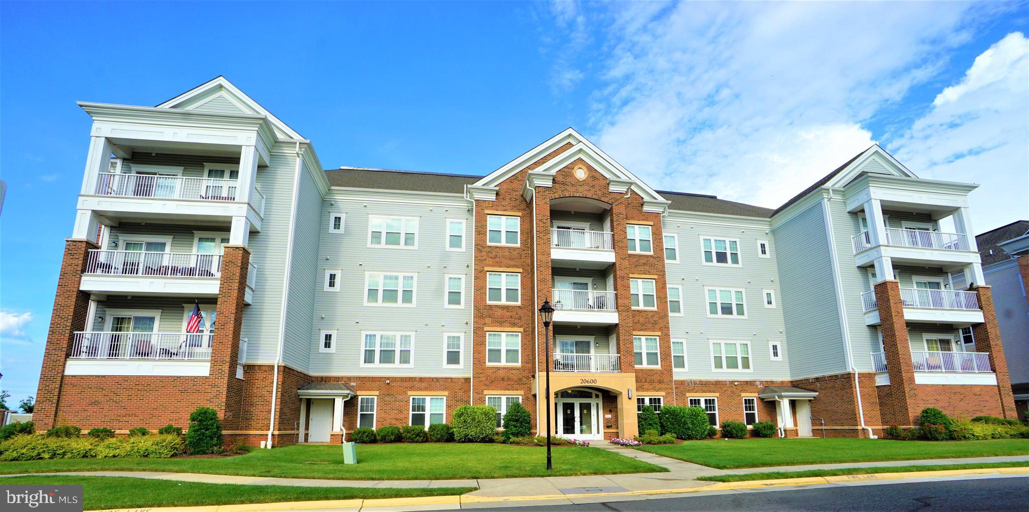 20600 Hope Spring Terrace, Unit 301 Ashburn, VA 20147 - Photo 1 of 33 Front of Building.