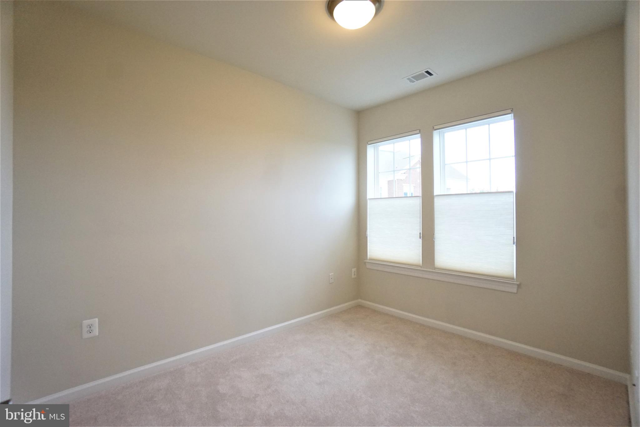 20600 Hope Spring Terrace, Unit 301 Ashburn, VA 20147 - Photo 25 of 33 Bedroom.