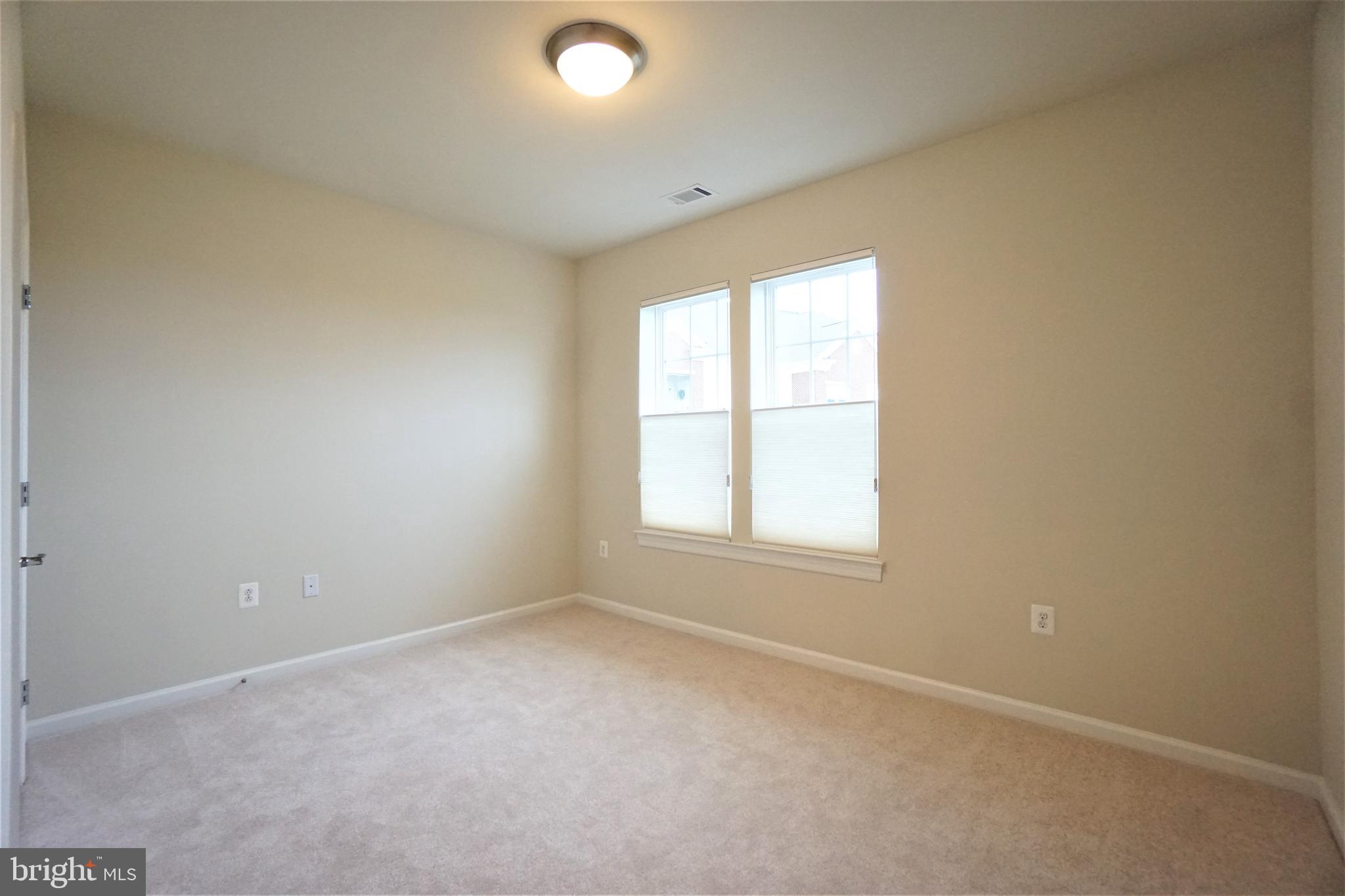 20600 Hope Spring Terrace, Unit 301 Ashburn, VA 20147 - Photo 26 of 33 Bedroom.