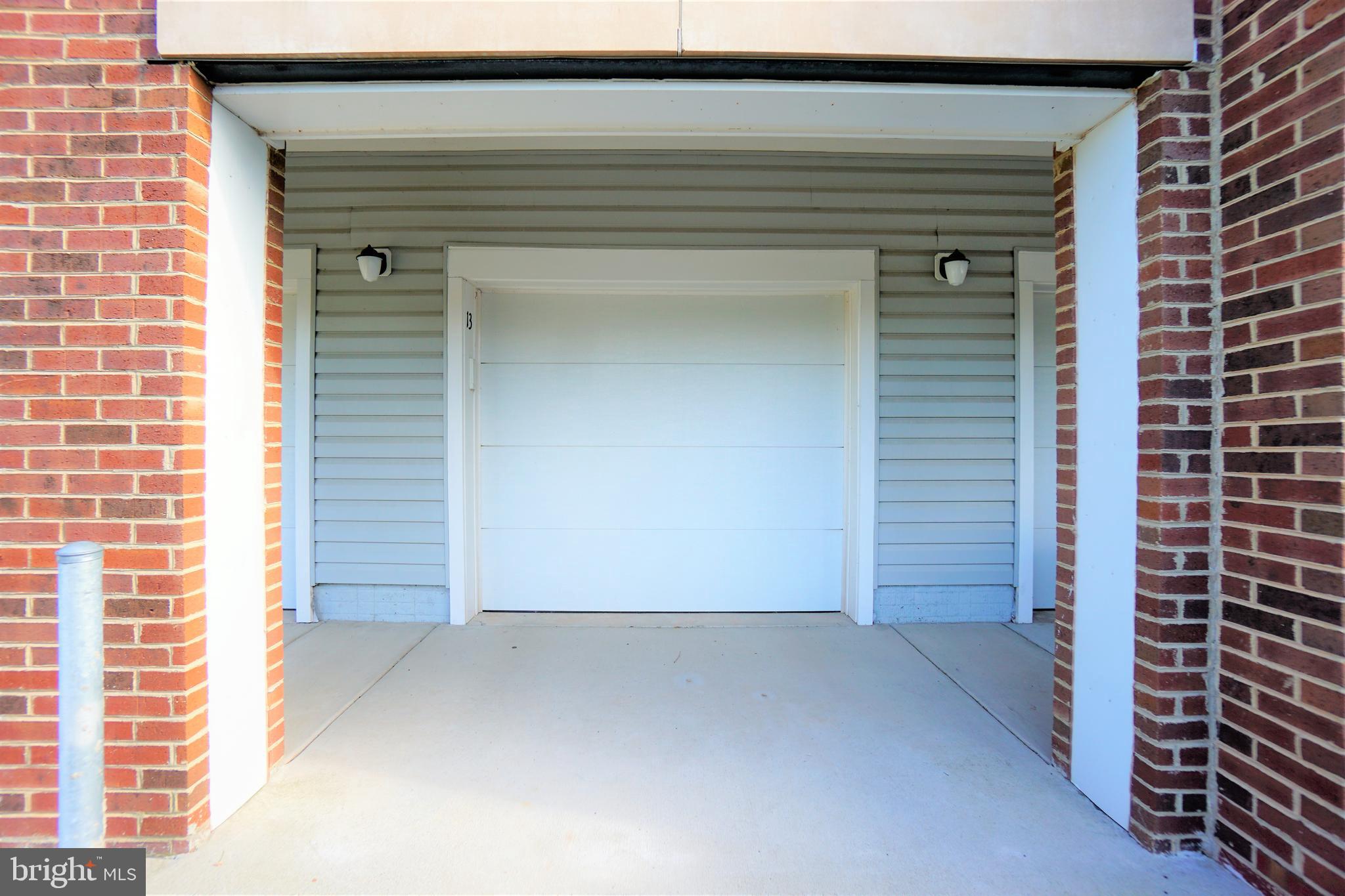 20600 Hope Spring Terrace, Unit 301 Ashburn, VA 20147 - Photo 29 of 33 Garage.