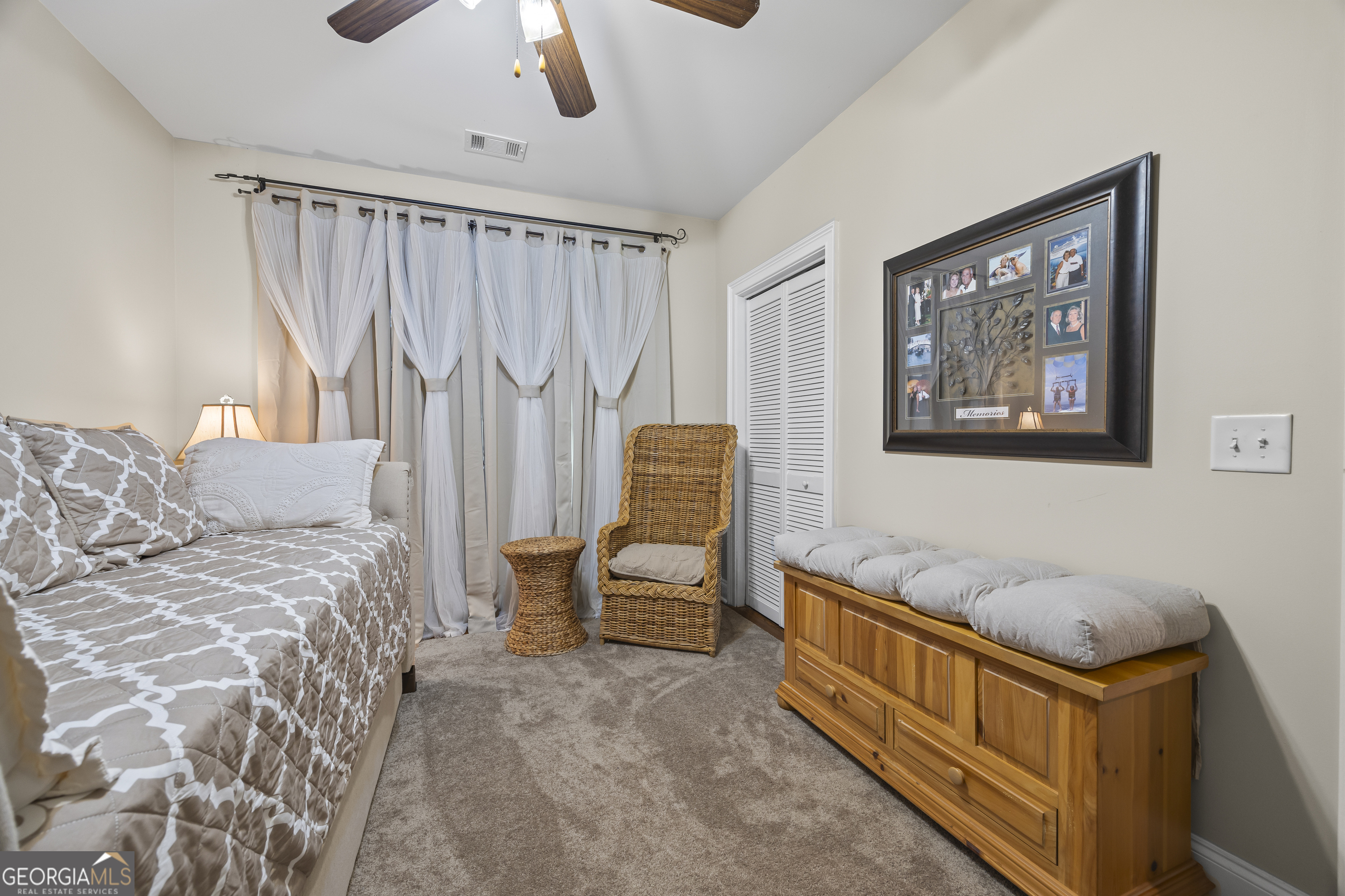 159 Zeppelin Strasse Helen, GA 30545 - Photo 61 of 95 a bedroom with a bed and a painting on the wall