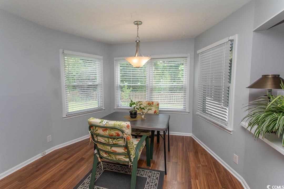18 Pine Valley Lane Surfside Beach, SC 29575 - Photo 16 of 35 Dining space with wood finished floors and baseboards
