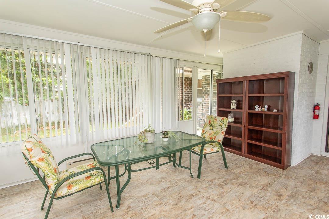 18 Pine Valley Lane Surfside Beach, SC 29575 - Photo 22 of 35 View of sunroom