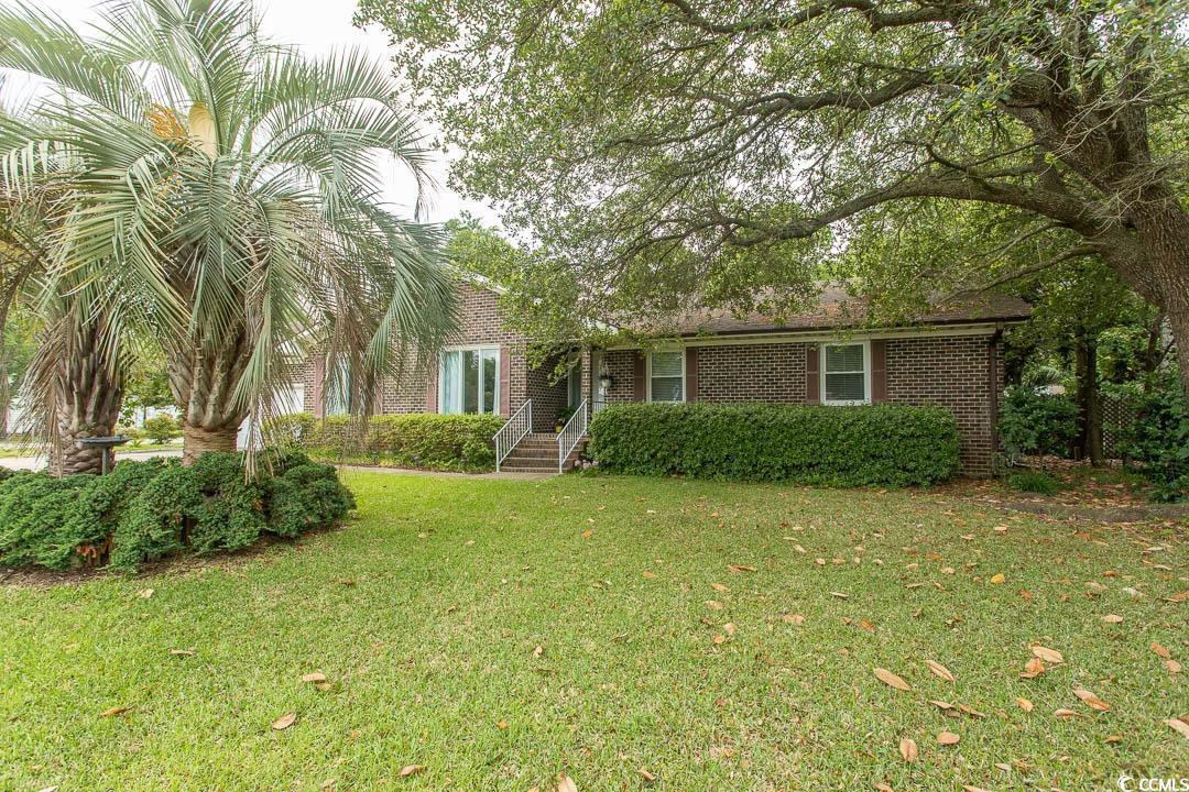 18 Pine Valley Lane Surfside Beach, SC 29575 - Photo 29 of 35 View of front of home featuring a front yard and brick siding