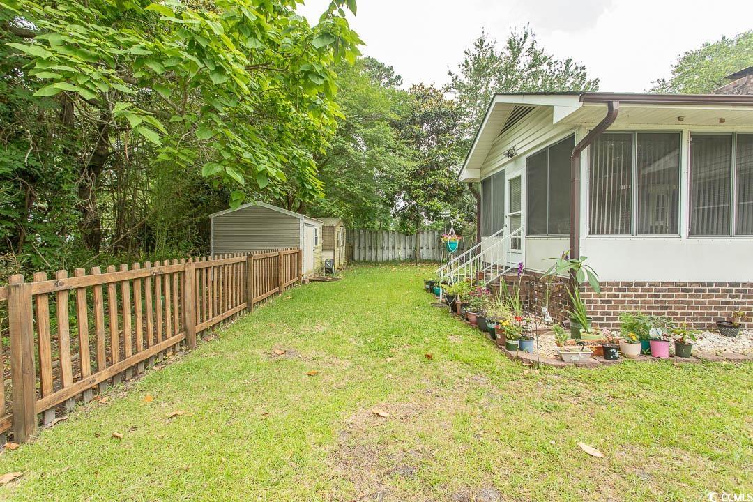 18 Pine Valley Lane Surfside Beach, SC 29575 - Photo 30 of 35 View of yard featuring a sunroom