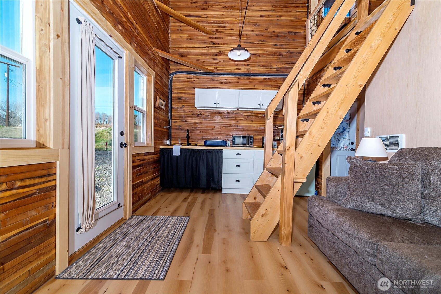 5920 4th Parallel Road Ellensburg, WA 98926 - Photo 11 of 30 a living room with furniture and wooden floor