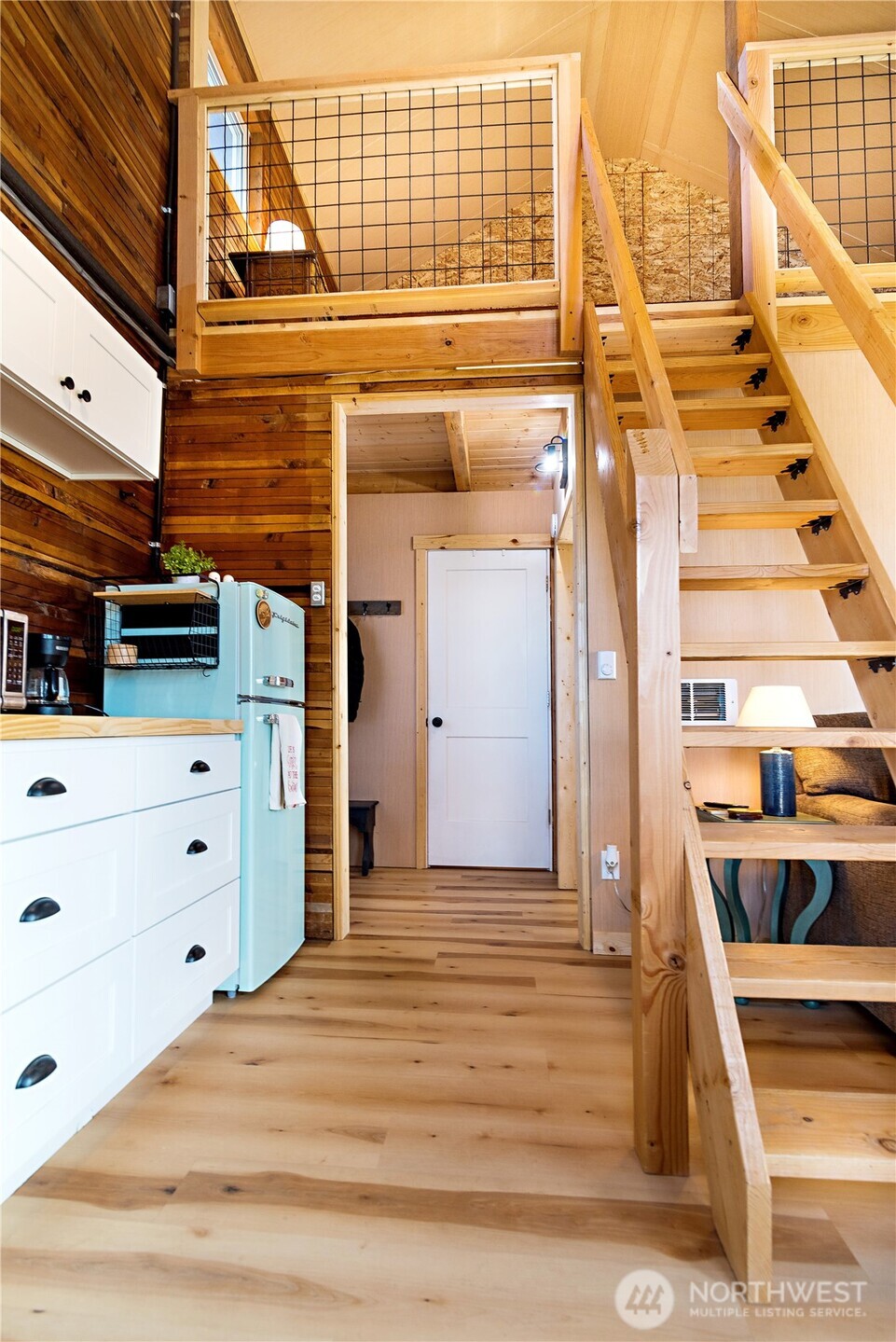 5920 4th Parallel Road Ellensburg, WA 98926 - Photo 14 of 30 a view of a balcony with lots of wooden cabinets and furniture