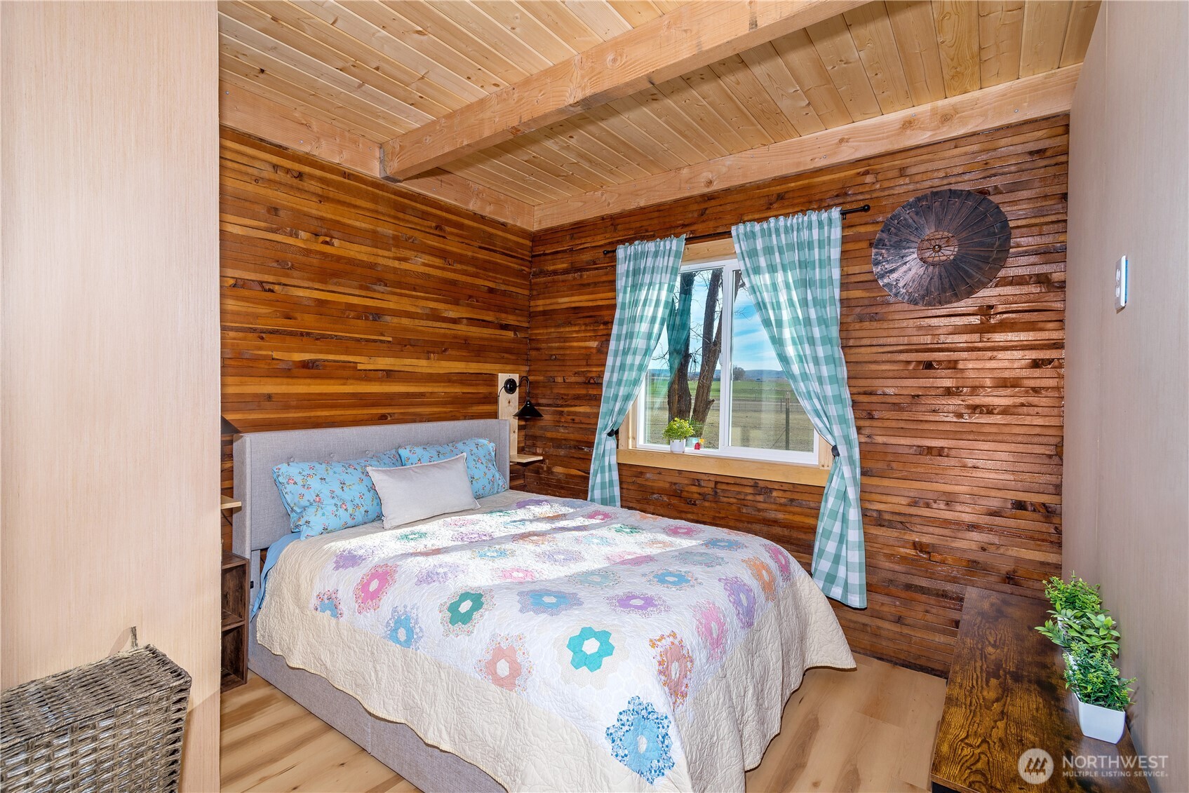 5920 4th Parallel Road Ellensburg, WA 98926 - Photo 20 of 30 a bed sitting in a bedroom next to a window