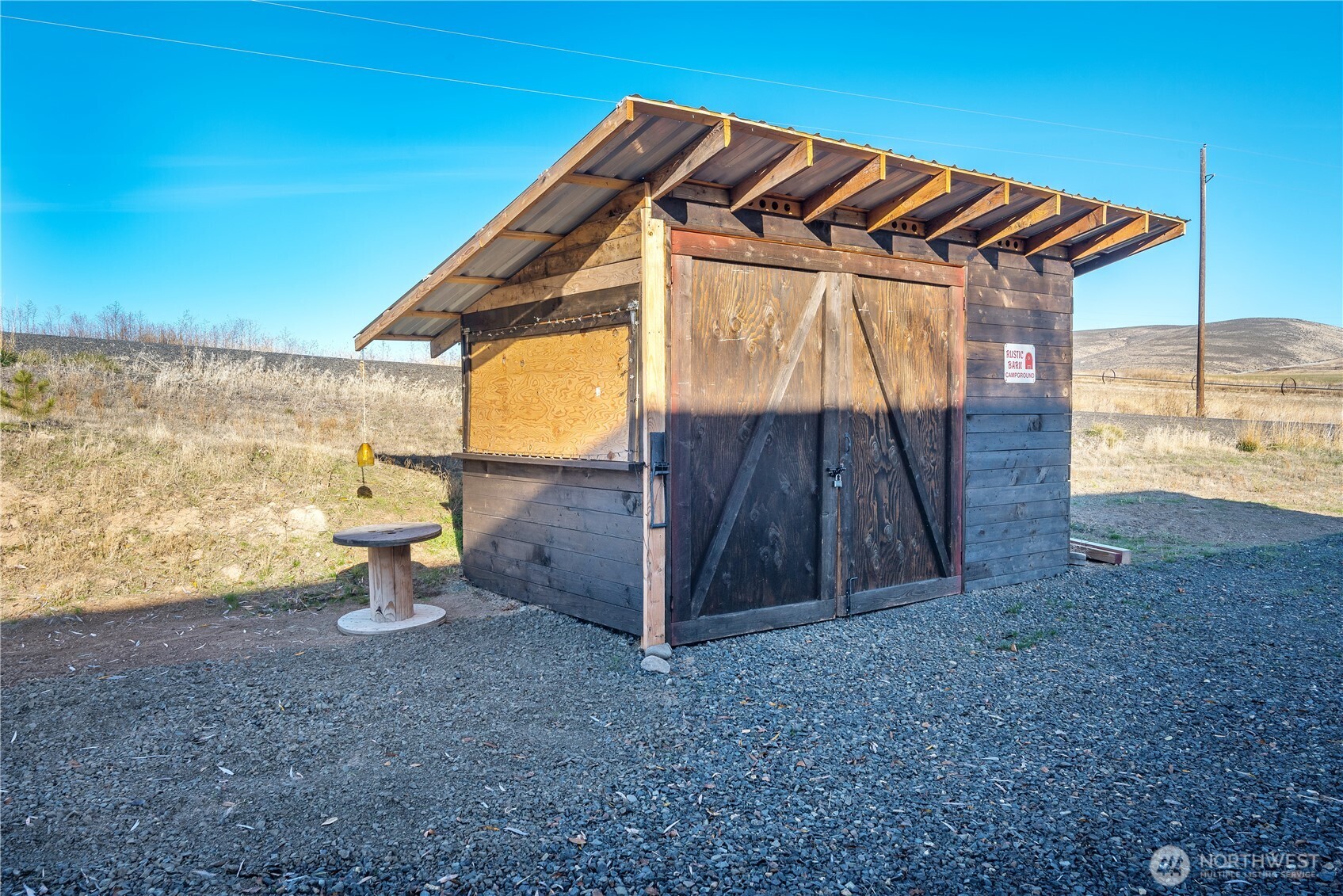 5920 4th Parallel Road Ellensburg, WA 98926 - Photo 27 of 30 a view of a backyard with wooden fence