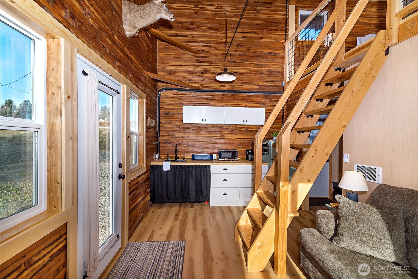 5920 4th Parallel Road Ellensburg, WA 98926 - Photo 8 of 30 a view of a livingroom with wooden floor and furniture