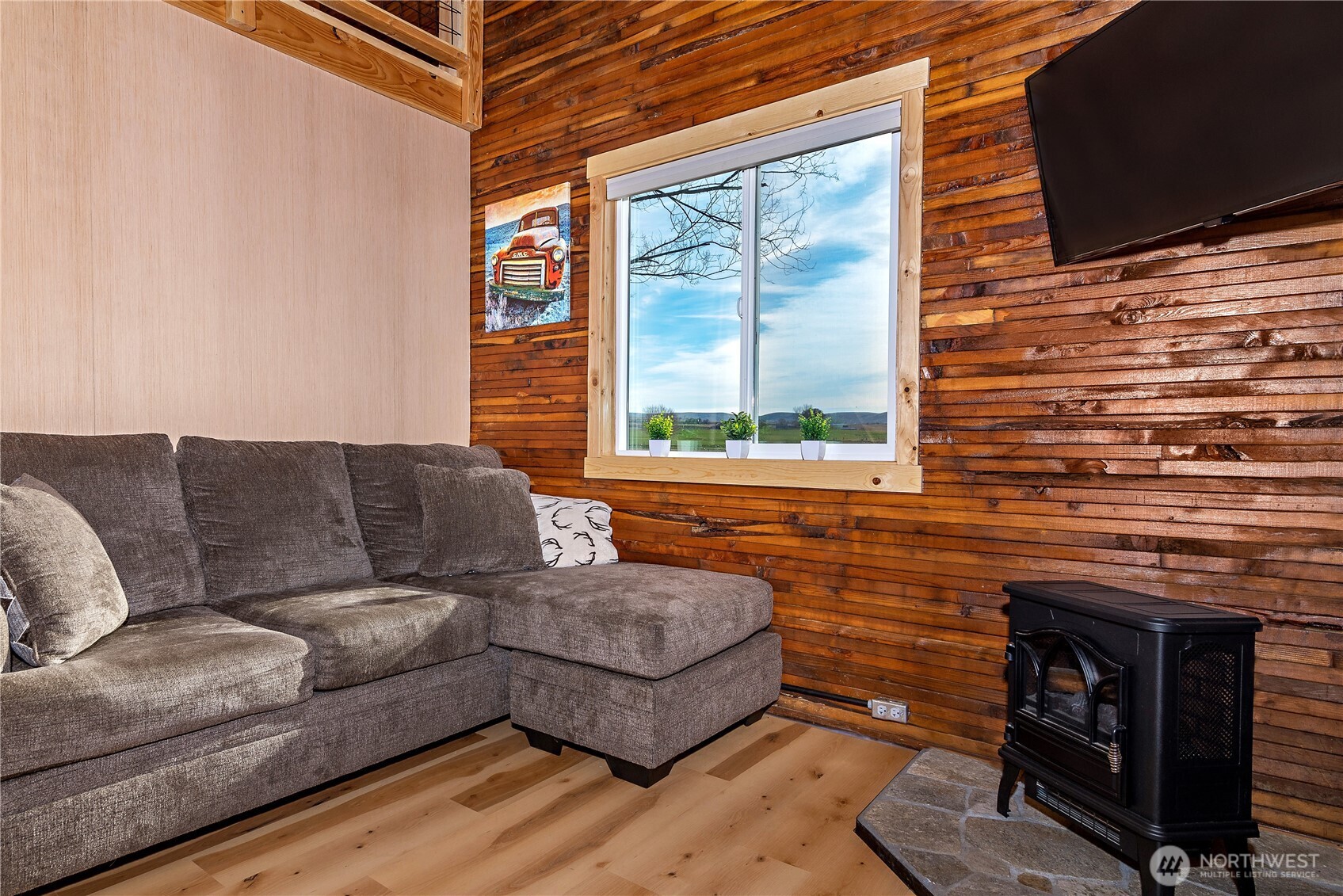 5920 4th Parallel Road Ellensburg, WA 98926 - Photo 10 of 30 a living room with furniture and a fireplace