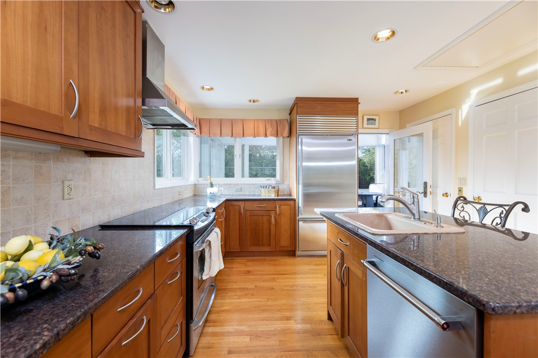 15 Reliance Drive Bristol, RI 02809 - Photo 12 of 38 Kitchen with view out to screened in porch