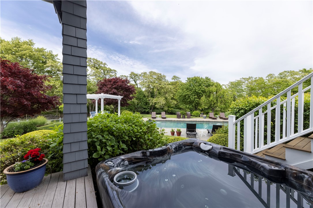 15 Reliance Drive Bristol, RI 02809 - Photo 26 of 38 Second guest room porch to hot tub and pool