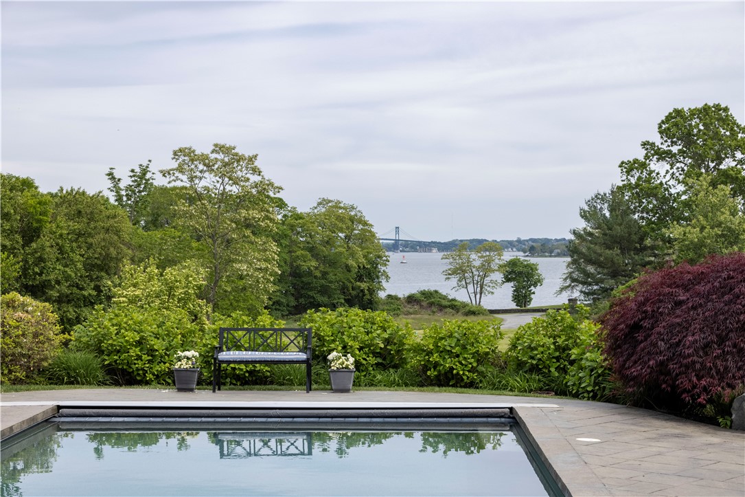 15 Reliance Drive Bristol, RI 02809 - Photo 28 of 38 Gunite pool with automatic retractable cover and views
