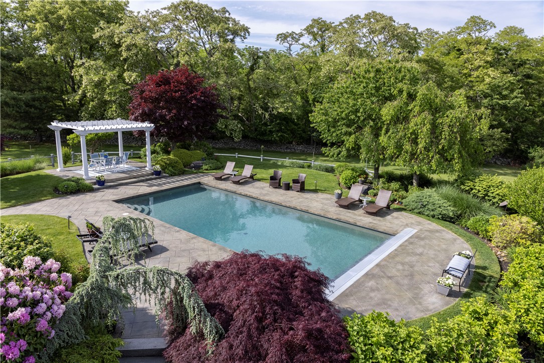 15 Reliance Drive Bristol, RI 02809 - Photo 30 of 38 lounges around the pool