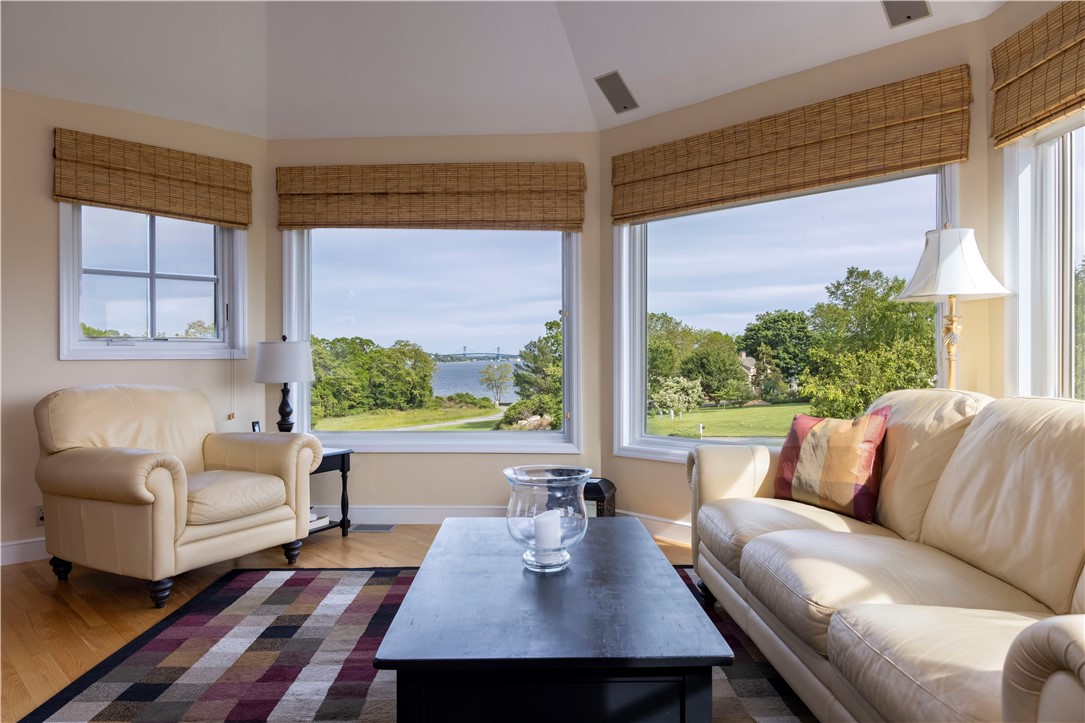 15 Reliance Drive Bristol, RI 02809 - Photo 8 of 38 Living Room with cathedral ceilings and views